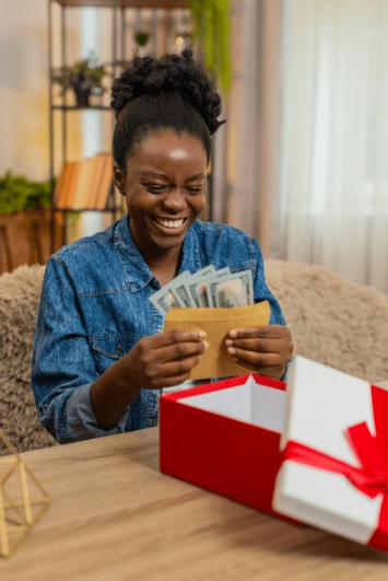 Person receiving a mobile money gift